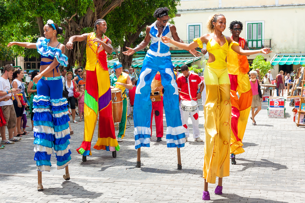 Afro-Cuban dancers on stilts at carnival in Old Havana