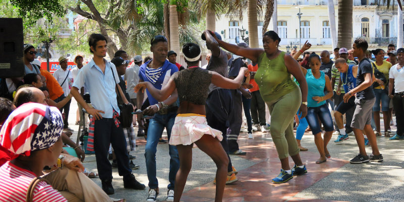 The Ultimate Cuba Travel Guide.  Cubans salsa dancing in Gran Parque in Centro Havana, Cuba.