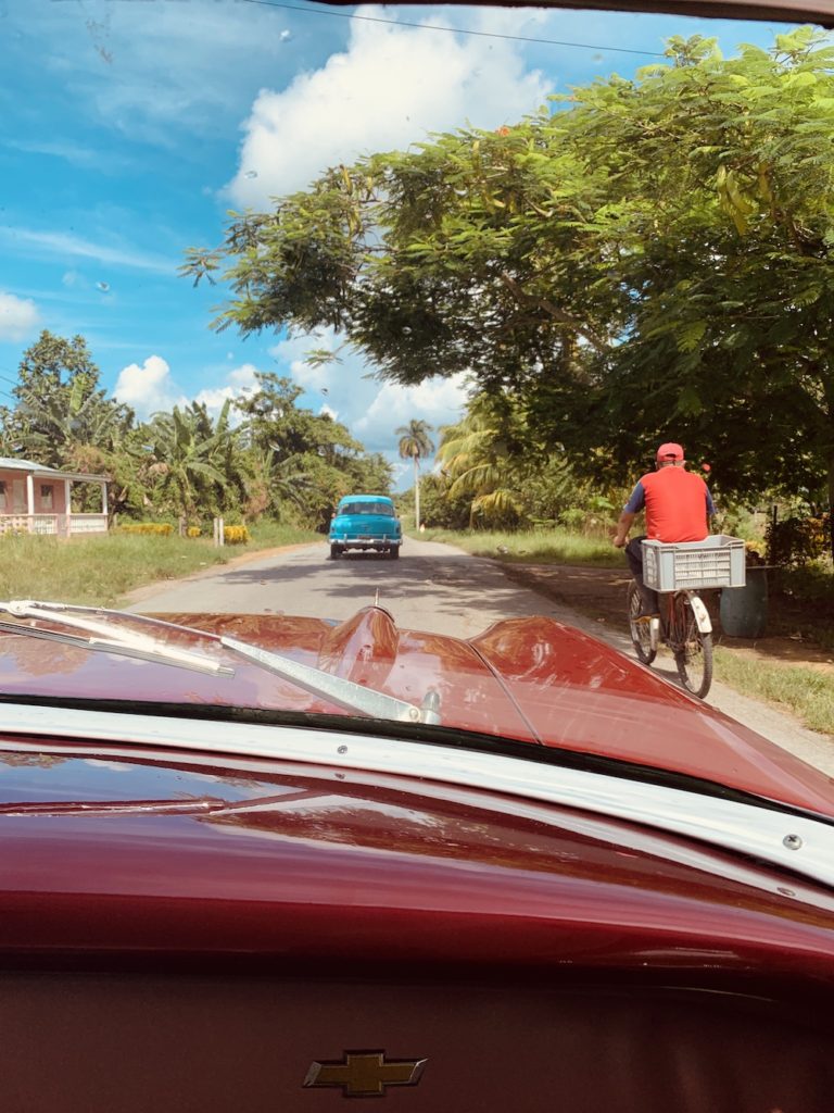 How To Take The Perfect Day Trip From Havana To Viñales.  Man on a bike in Vinales, Pinar del Rio
