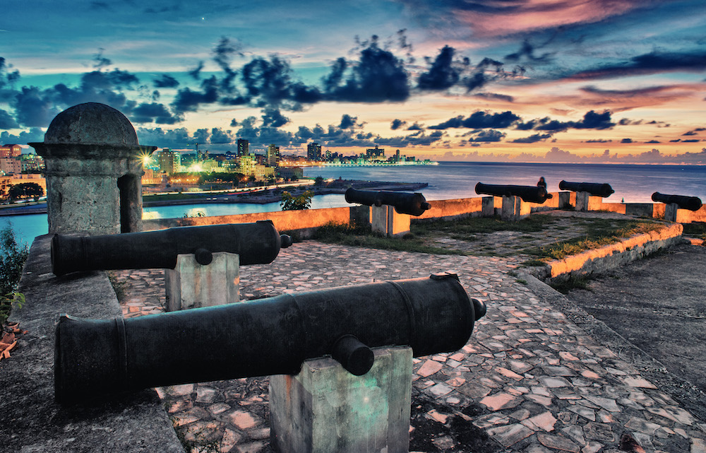 Cuba Bucket List: 10 Best Things To Do In Cuba. Beautiful sunset and views of Havana from El Morro del Castillo. 