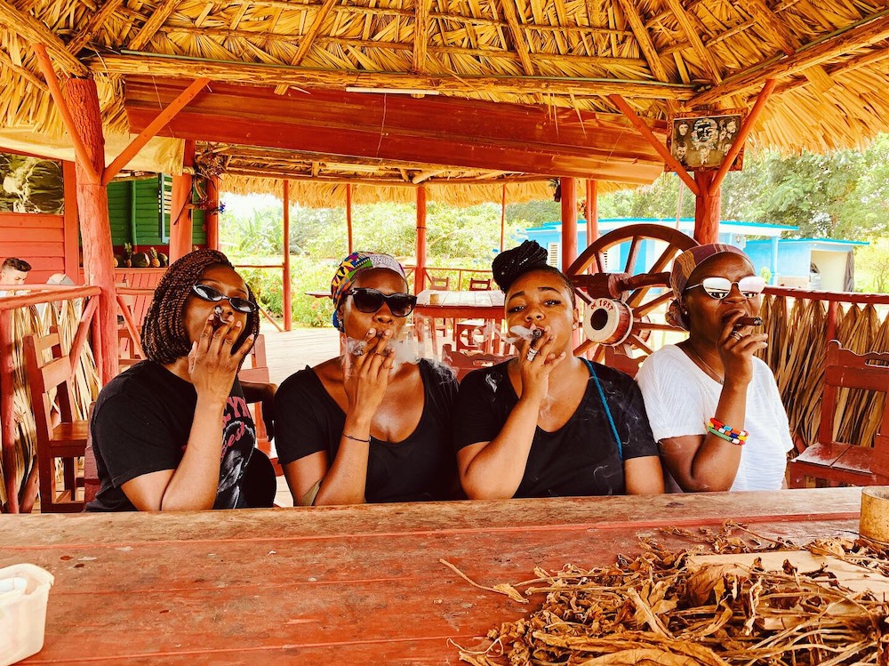 101 Fun Things To Do in Cuba. After learning how to hand roll our cigars, it was only right that we smoked it! In Vinales, Cuba. 