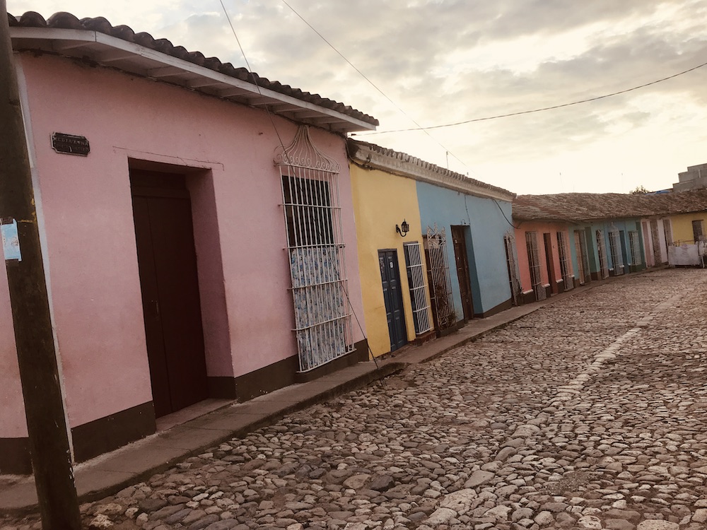 10 Things To Know Before Traveling To Cuba.  Sherbet colored homes in Trinidad, Cuba. 