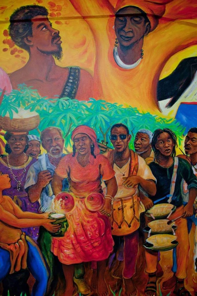 Pen Cayetano’s mural “Hayawadina Wayunagu” - imagery of our ancestors. 9 Ways To Experience Garifuna Culture in Belize.  