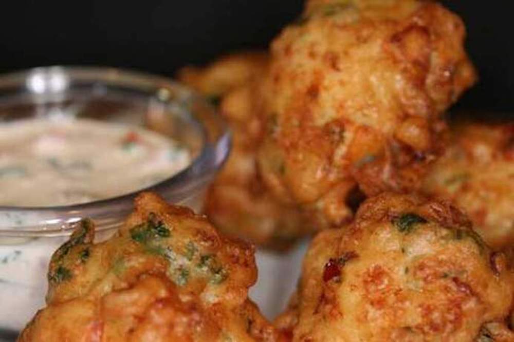 10 Delicious Foods To Try in Belize. Conch fritters are mouth watering tasty bites.  Must try when visiting Belize!  