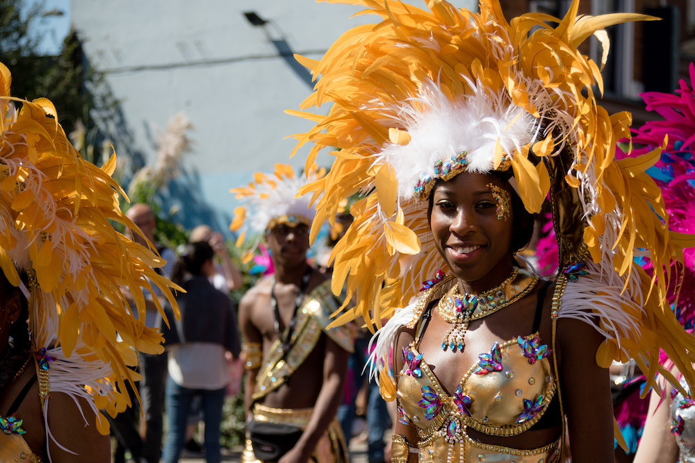 Lady playing mas at Notting Hill Carnival in London, United Kingdom.