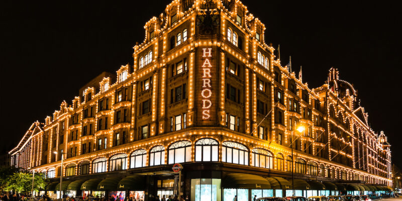 The famous Harrods department store in the evening at Knightsbridge, London, UK.