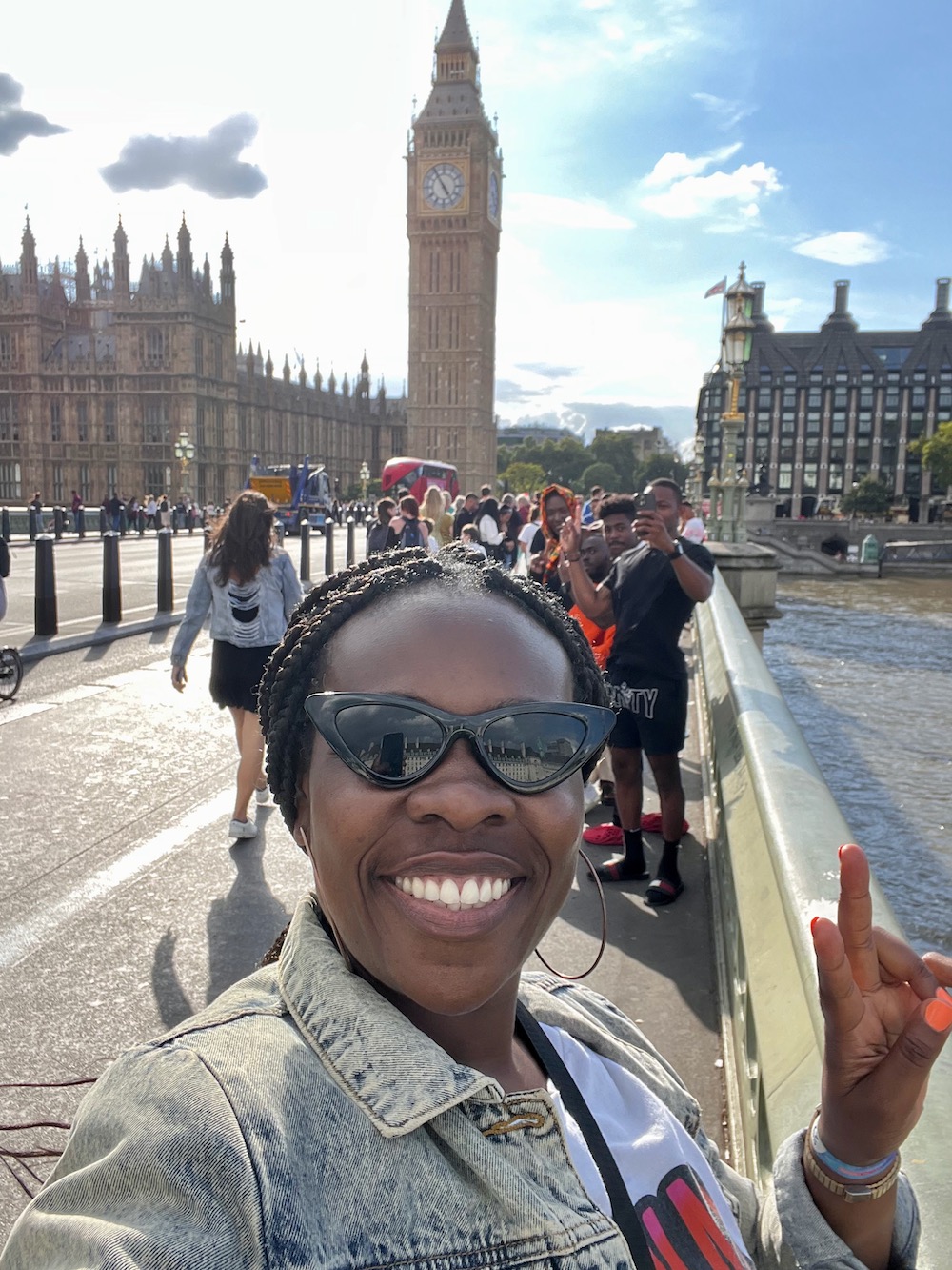 Image of Lady Chin taking a selfie in front of Big Ben and the Houses of Parliament.