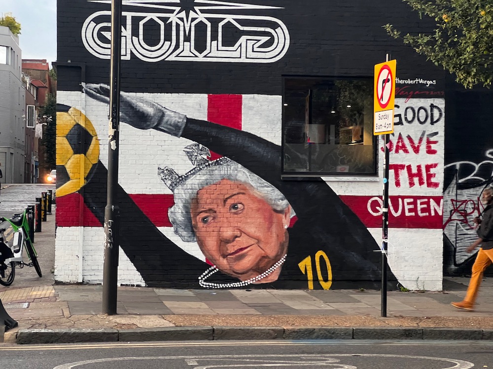 Street art of the late Queen of England in Shoreditch, London, UK. 