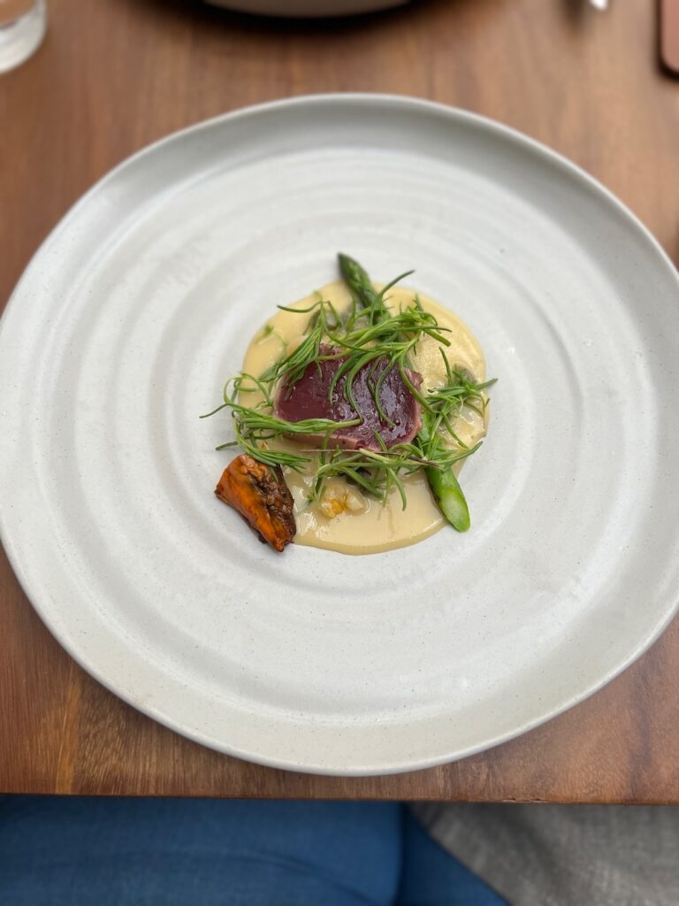 Tuna mussel, squash huatape, asparagus, cacahuazintle dish at pujol in Mexico City.