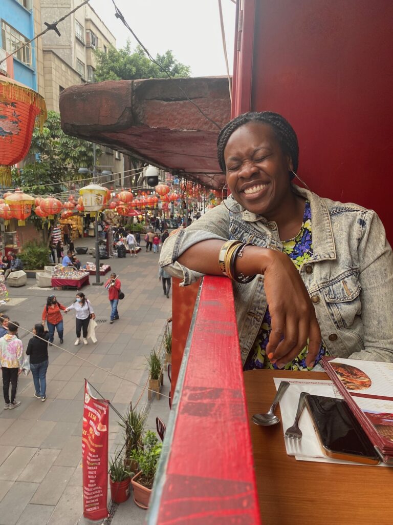 Image of Lady Chin laughing at the Hong Kong Restaurant in Mexico City. 