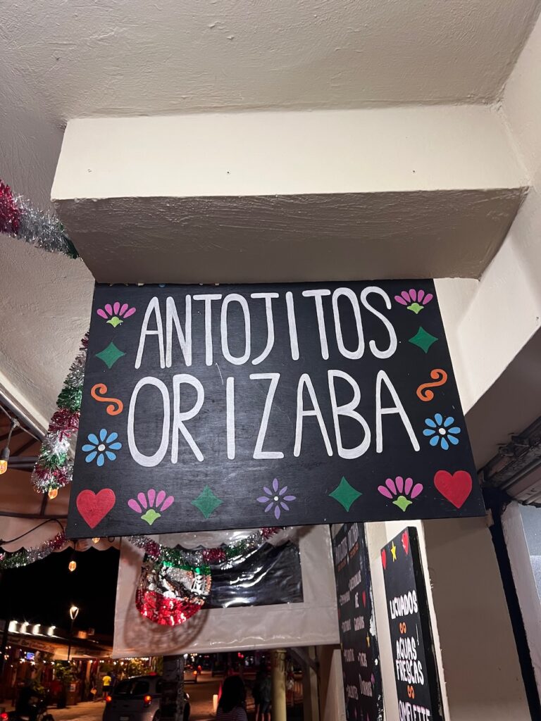 Antojitos Orizaba sign in Bacalar Lagoon, Mexico. 