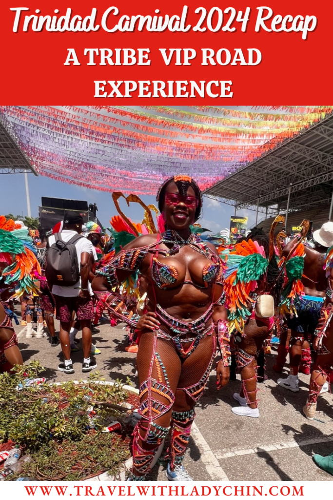 Black woman standing dressed in a colorful costume at Trinidad Carnival. 