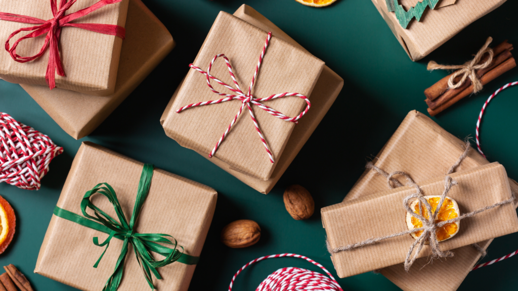 Gifts boxes with brown wrapping paper and ribbons.