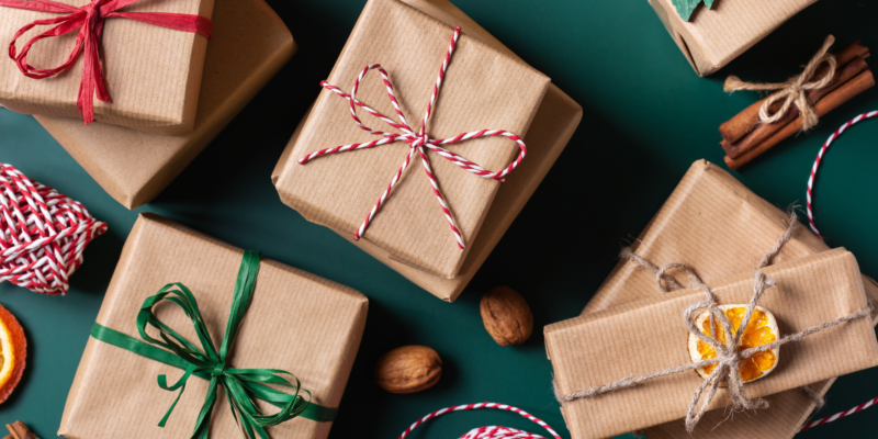 Gifts boxes with brown wrapping paper and ribbons.